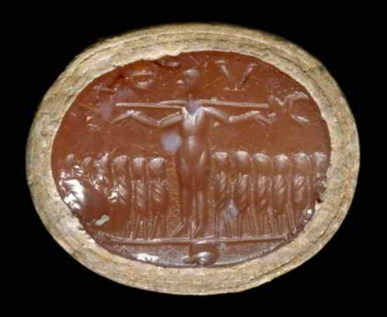 Cette artefact représente un homme sur une croix